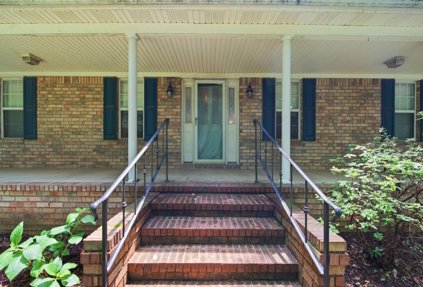 Brick exterior with a covered porch.