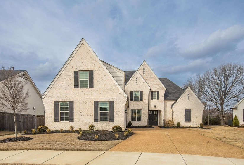 View of front of property with brick siding