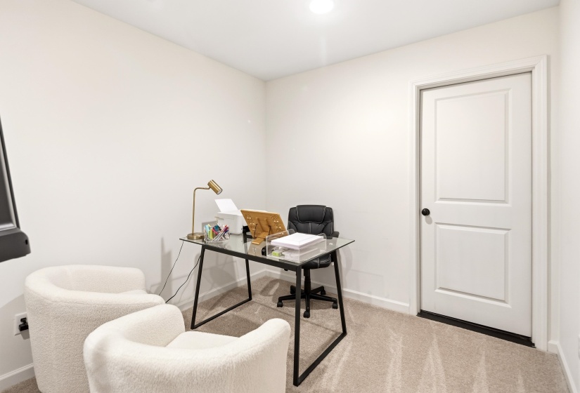 Home office featuring carpet flooring