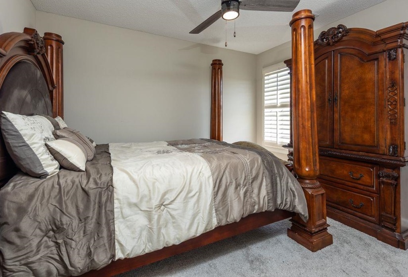 Room featuring light gray wall paint and textured ceiling