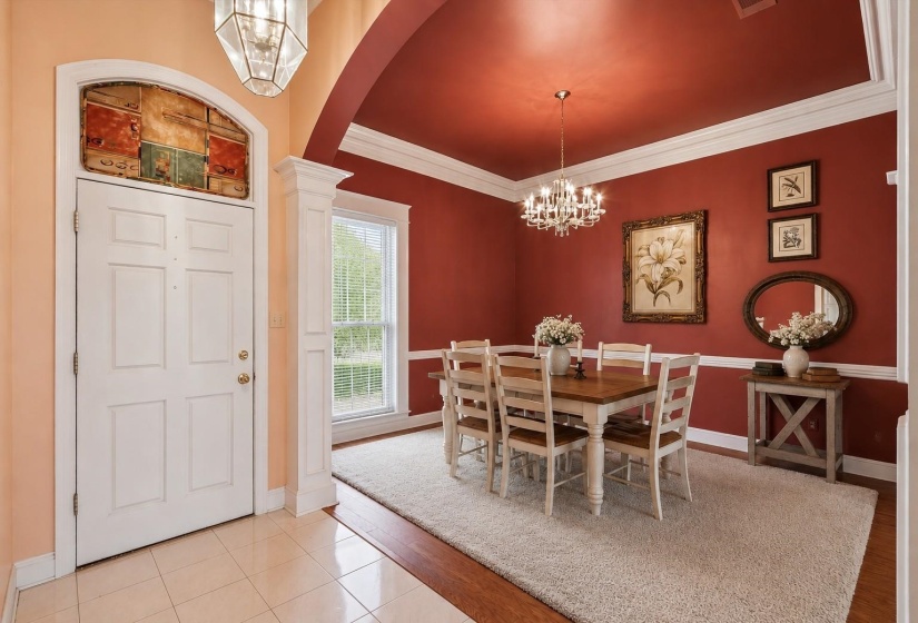 ENTRY (10x6) – Welcoming foyer with durable tile flooring, creating an inviting first impression for guests.                                  Virtually staged photo.