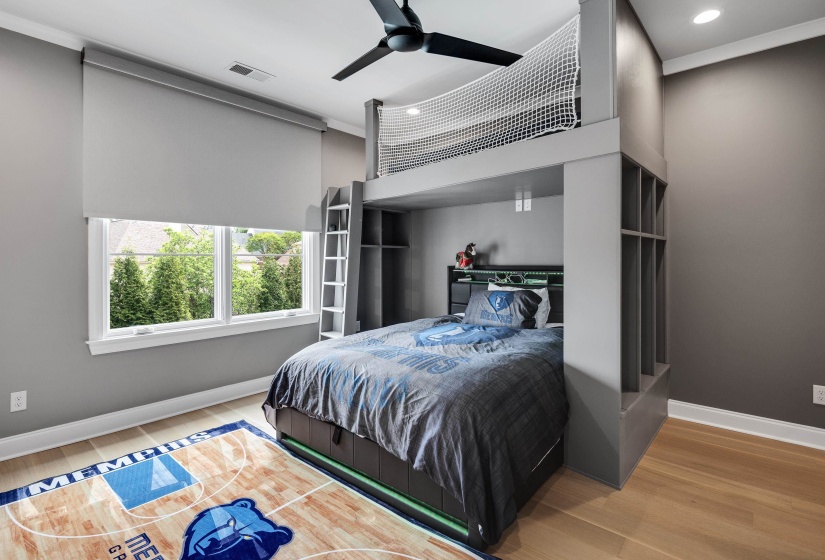 Built-in loft bed structure with integrated ladder and shelving