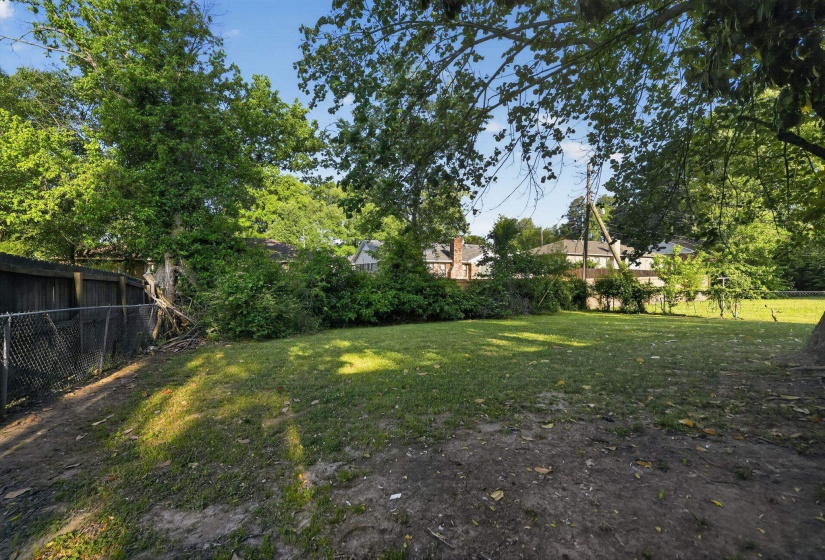 View of fenced backyard