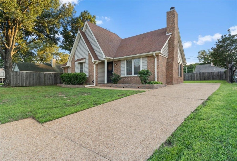 Brick and siding exterior with gabled roofline