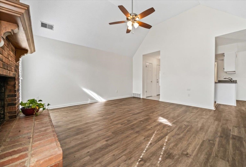 Entry is in the background (left). Kitchen is in the background (right).