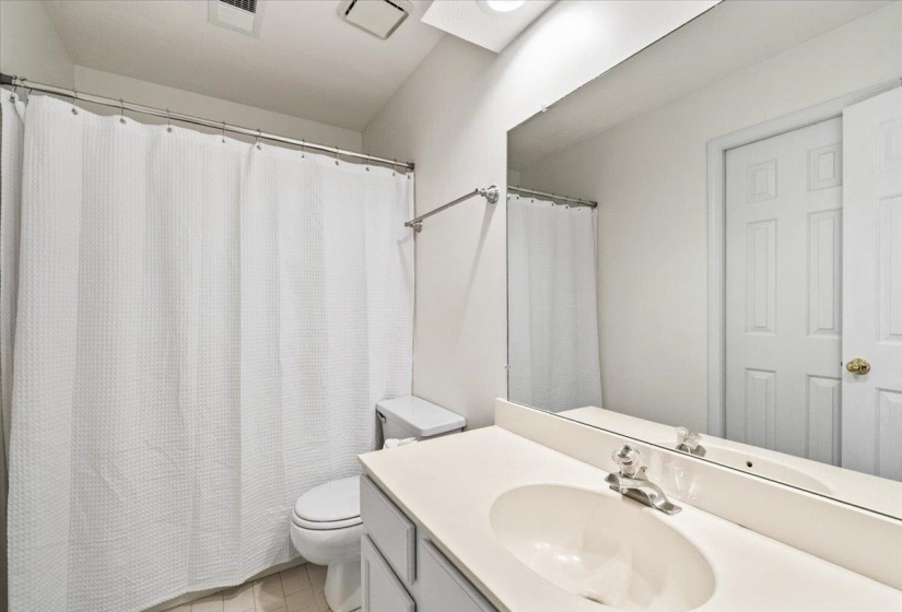 Direct access from Second Bedroom.  Also serves as Guest Bath.