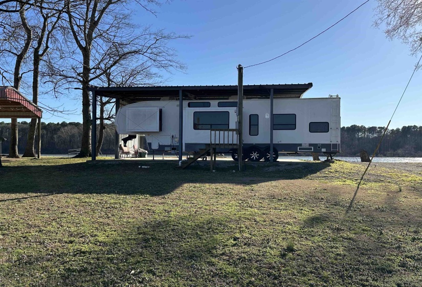 Exterior space featuring a lawn
