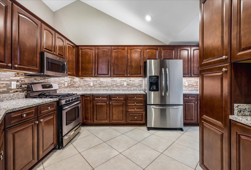 Granite countertop, beautiful backsplash