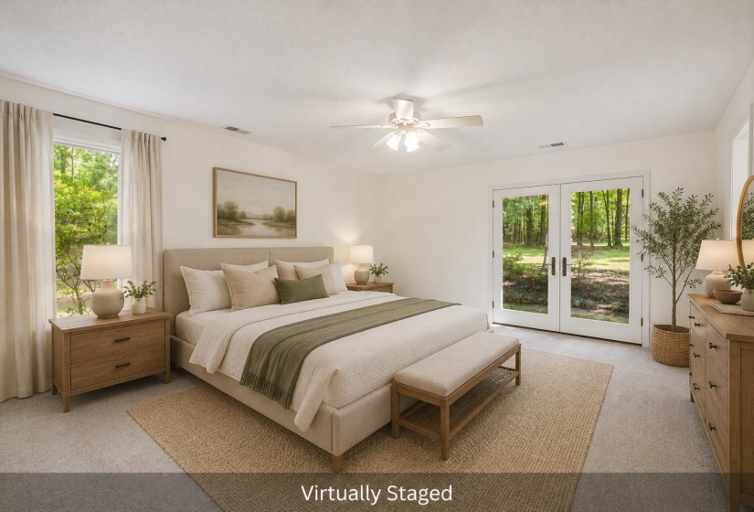 Bright room with neutral wall paint and light-colored carpeting