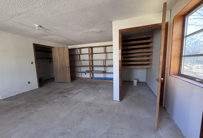 Basement with a textured ceiling