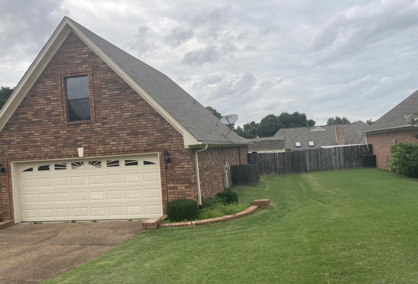Brick exterior with a peaked gable roofline
