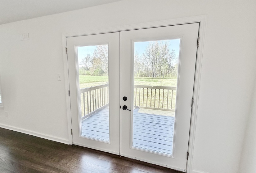 Entryway featuring french doors and hardwood floors