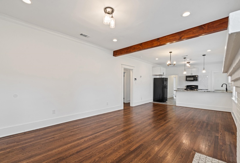 Hardwood flooring throughout the main living area