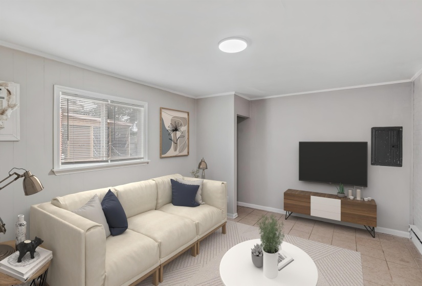 Living area featuring light gray walls, white trim, and tile flooring