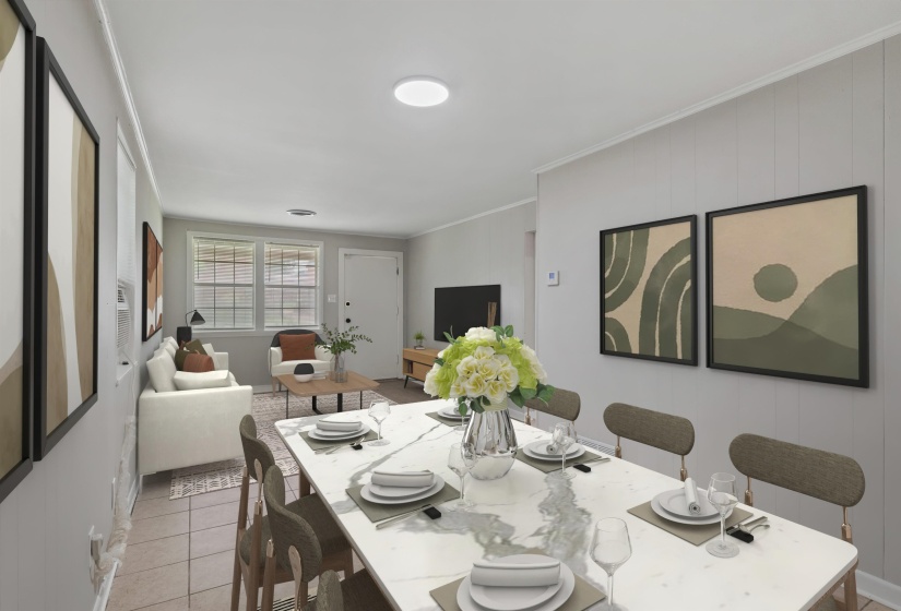 Open-concept living and dining area featuring a rectangular dining table with a marble-finish top
