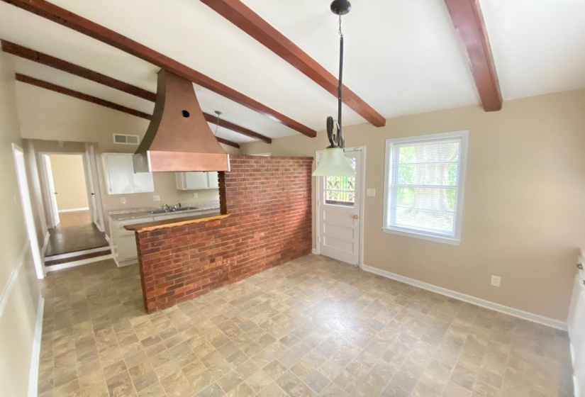 Vaulted ceiling with exposed wood beams