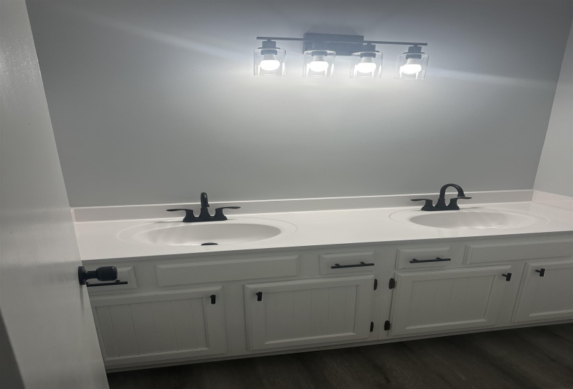 Bathroom featuring double vanity