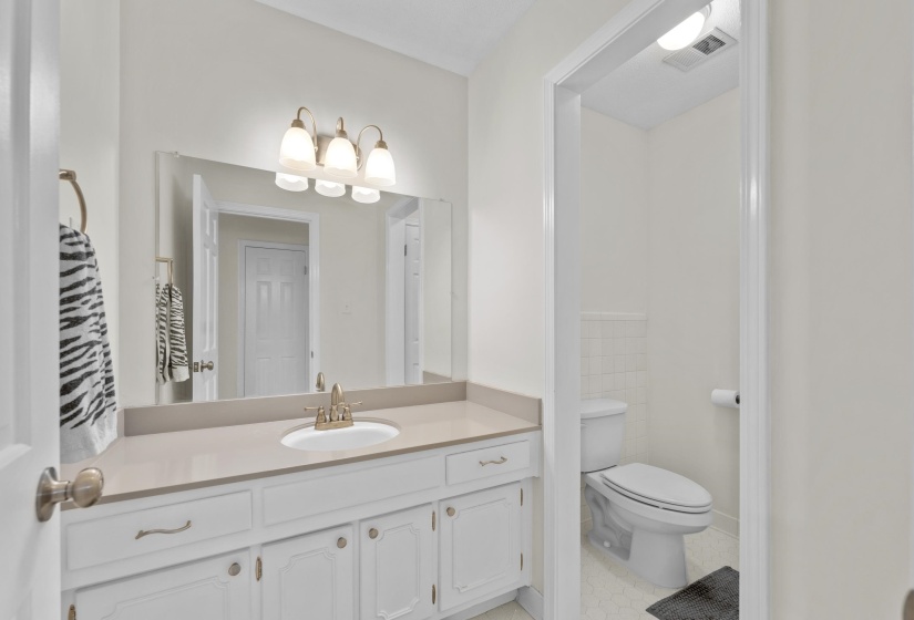 Your guests can powder their nose in the nice half bathroom downstairs.