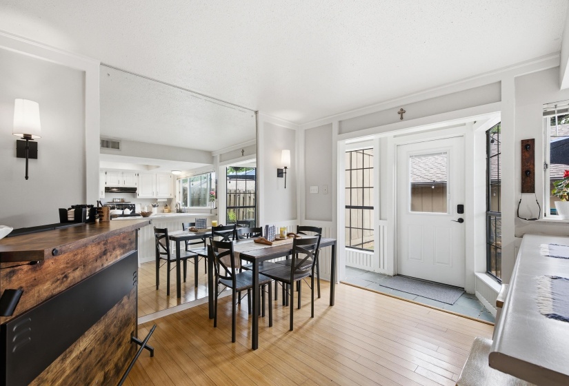 Looking toward the back door, there is a small entry area that is perfect for shoes, coats and dropping items down.  Not many of the units have this feature.