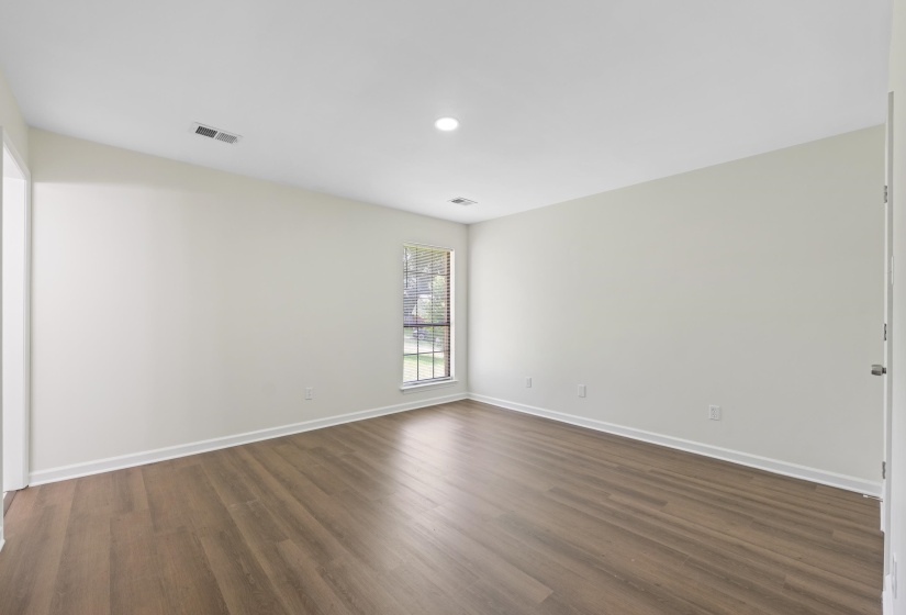 View of the primary bedroom unfurnished.