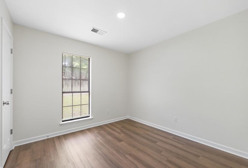 View of the second bedroom unfurnished.