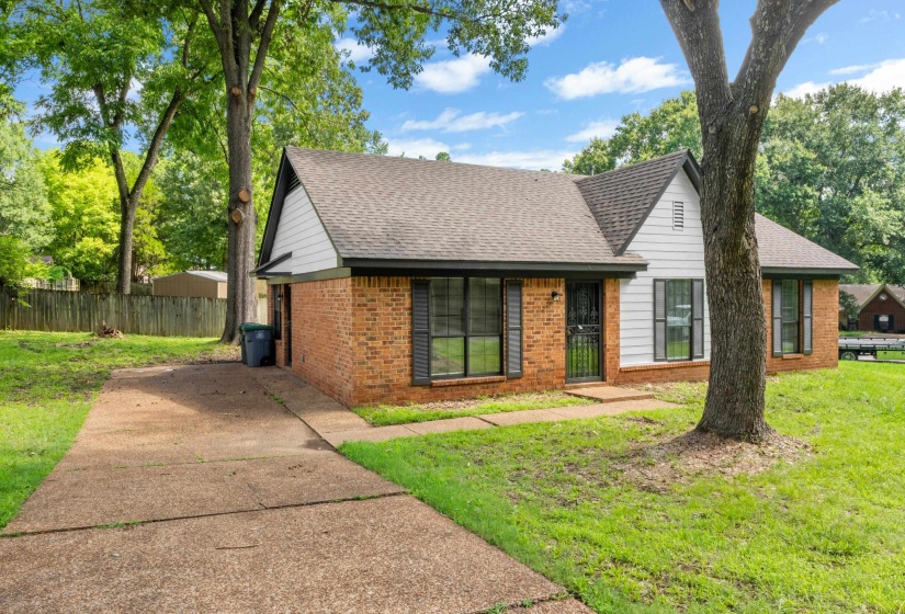 Extended driveway provides convenient parking and easy access to the home.
