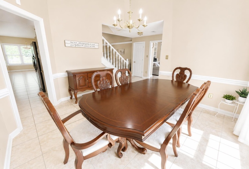 Neutral tone walls with white chair rail molding
