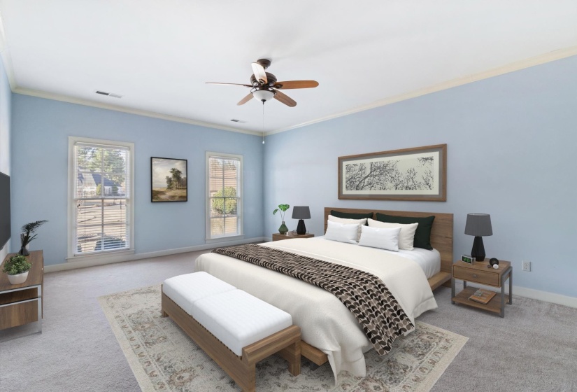 Bedroom featuring ornamental molding, light carpet, and a ceiling fan