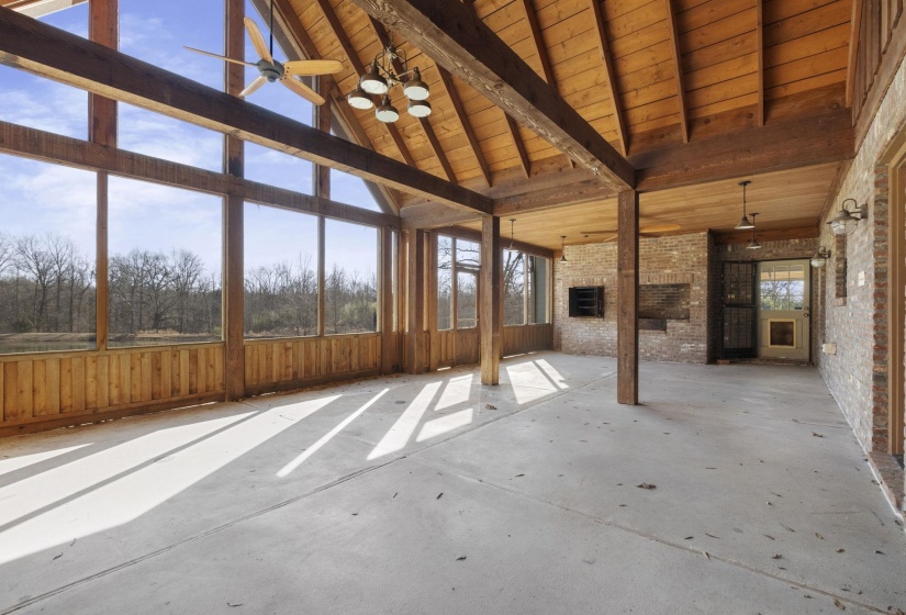 Unfurnished sunroom featuring healthy amount of natural light