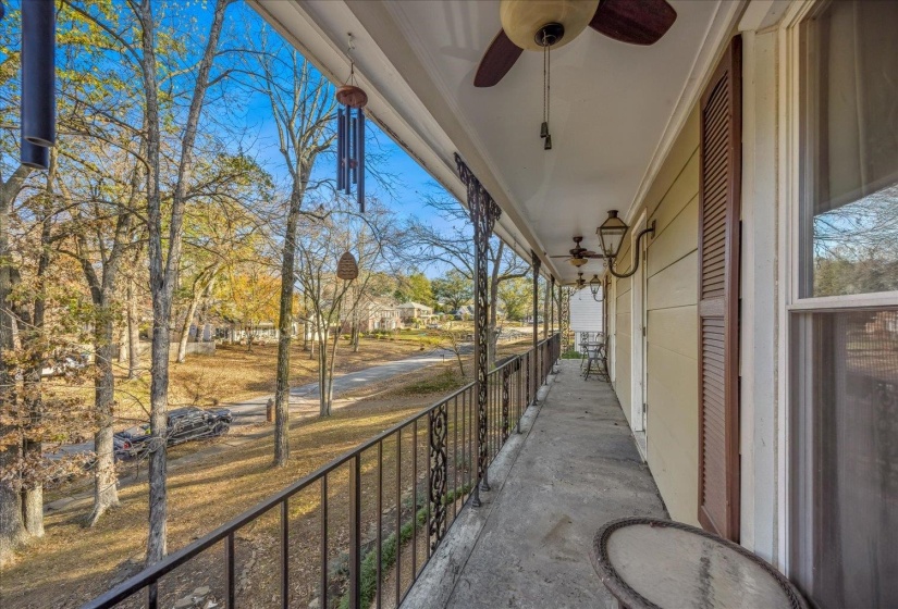 Patio / terrace with a ceiling fan