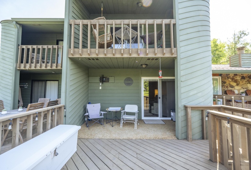 Multi-level deck and balcony spaces featuring natural wood railings
