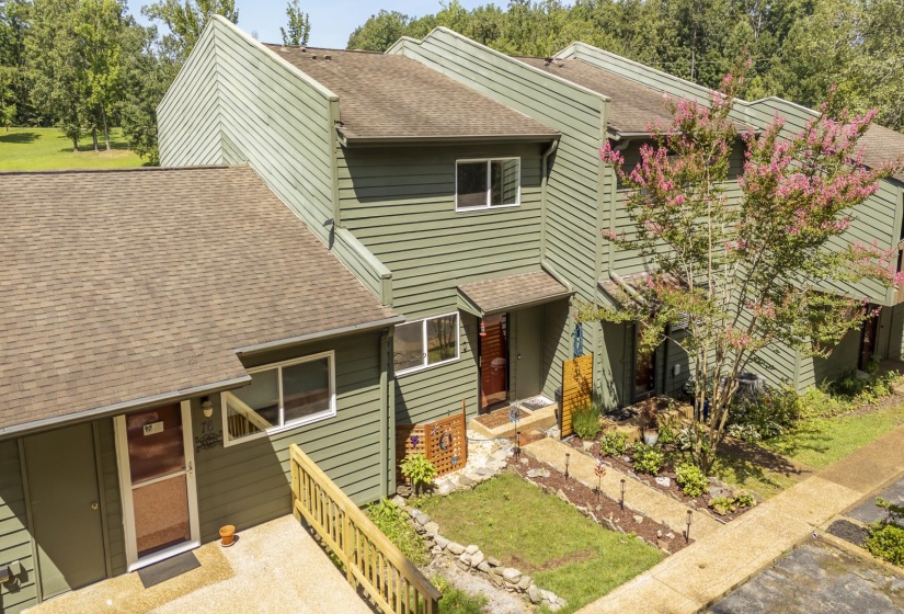 Exterior facade featuring horizontal siding and pitched roofs