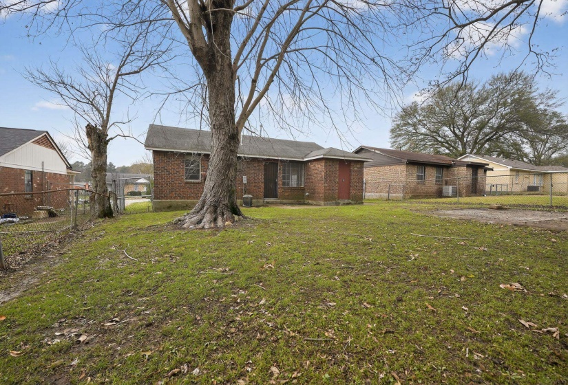 View of front of property with brick siding