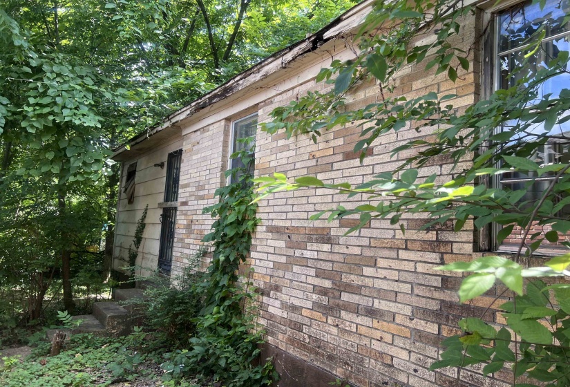 Brick exterior with a multi-tonal brown and beige palette