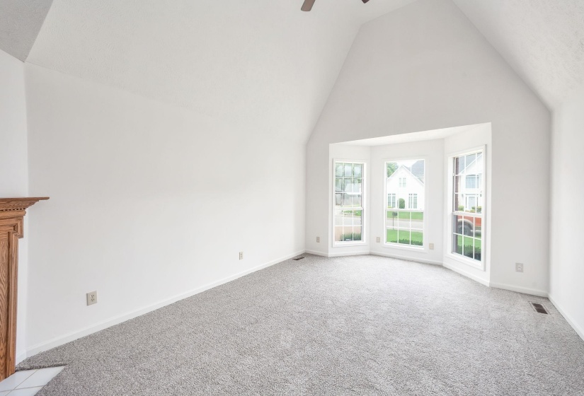 Vaulted ceiling with an overhead fan