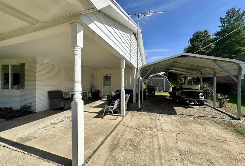 Covered concrete patio with decorative support columns