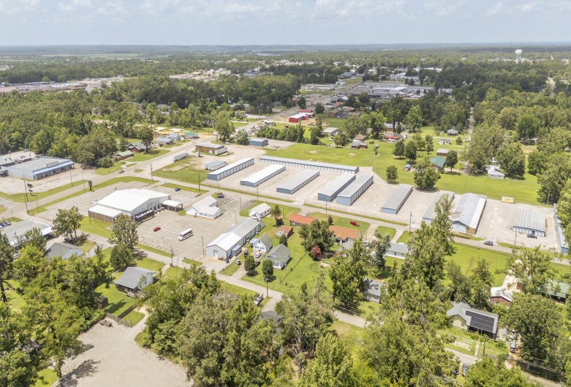 Expansive aerial perspective showcasing a commercial property with multiple buildings