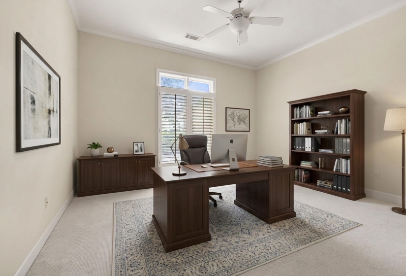 Spacious room featuring vaulted ceilings, light-toned carpeting, and crown molding