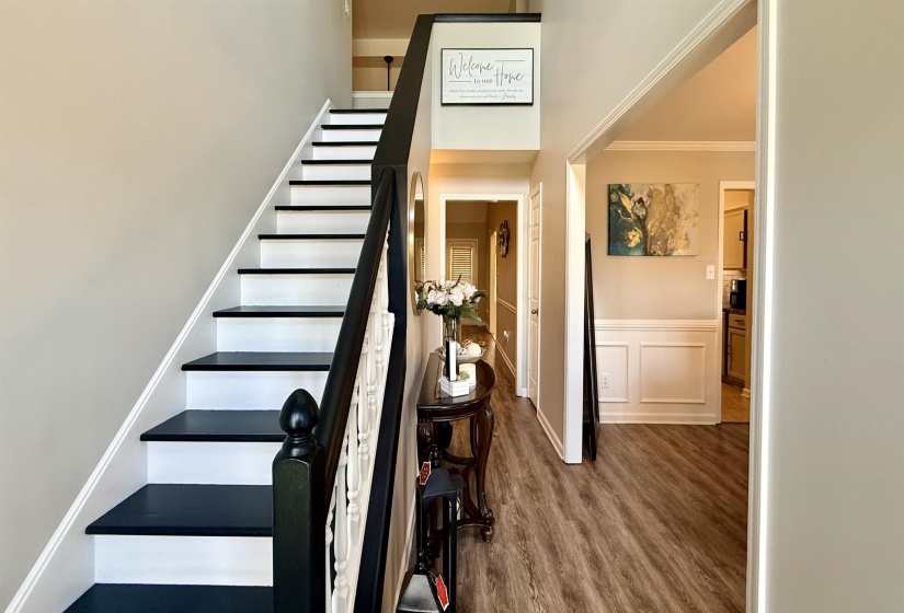 Two-tone staircase featuring painted risers and dark treads