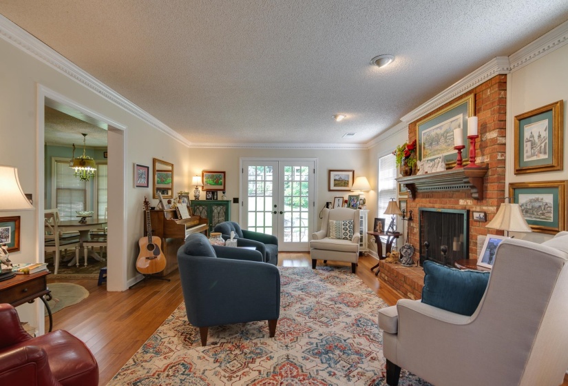 Den is open to the front living room giving plenty of space for entertaining.