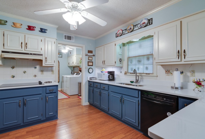 Beautiful bamboo floors accent this spacious kitchen.