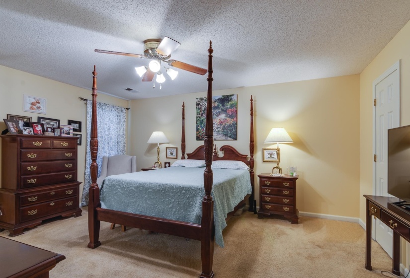 Large primary bedroom suite offers 2 closets and full bathroom.