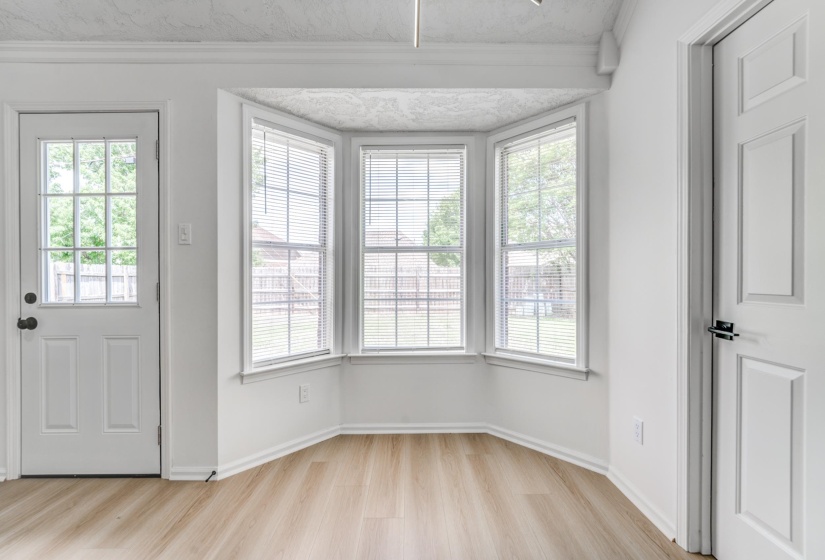 Bay window featuring three panels with individual blinds