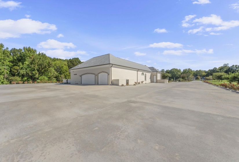 View of outdoor structure featuring a garage