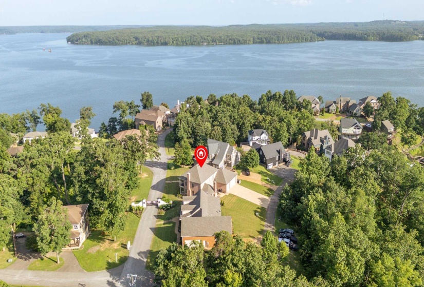 Aerial perspective of a residential community with a waterfront setting