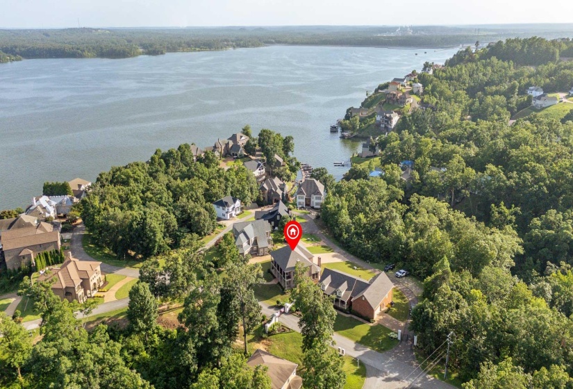 Waterfront community featuring an established residential area with mature trees and diverse architectural styles