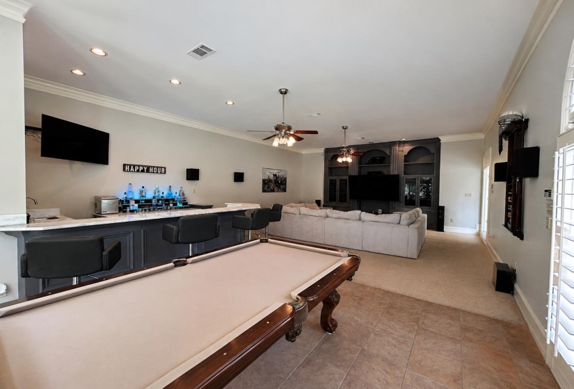 Includes Bar with Marble Counter and Custom Cabinetry and Beautiful Views of the Backyard
