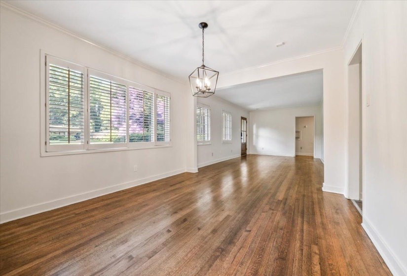 Hardwood flooring extending throughout the space