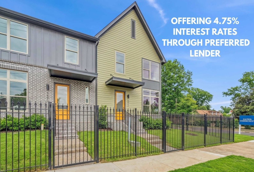 Contemporary townhome residences featuring varied exterior finishes including vertical siding and brickwork
