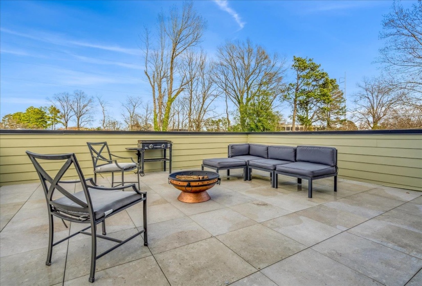 View of patio / terrace with an outdoor living space with a fire pit